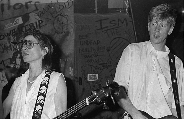 Kim Gordon & Thurston Moore, Sonic Youth at CBGB © Stephanie Chernikowski, 1983, Courtesy The Museum of Modern Art