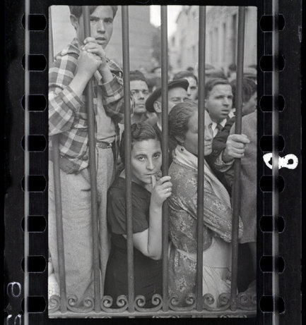 VALENCIA, Spain—A crowd at the gate of a morgue after an air raid, May 1937. © Gerda Taro © 2002 by International Center of Photography/Magnum Photos / Magnum Photos