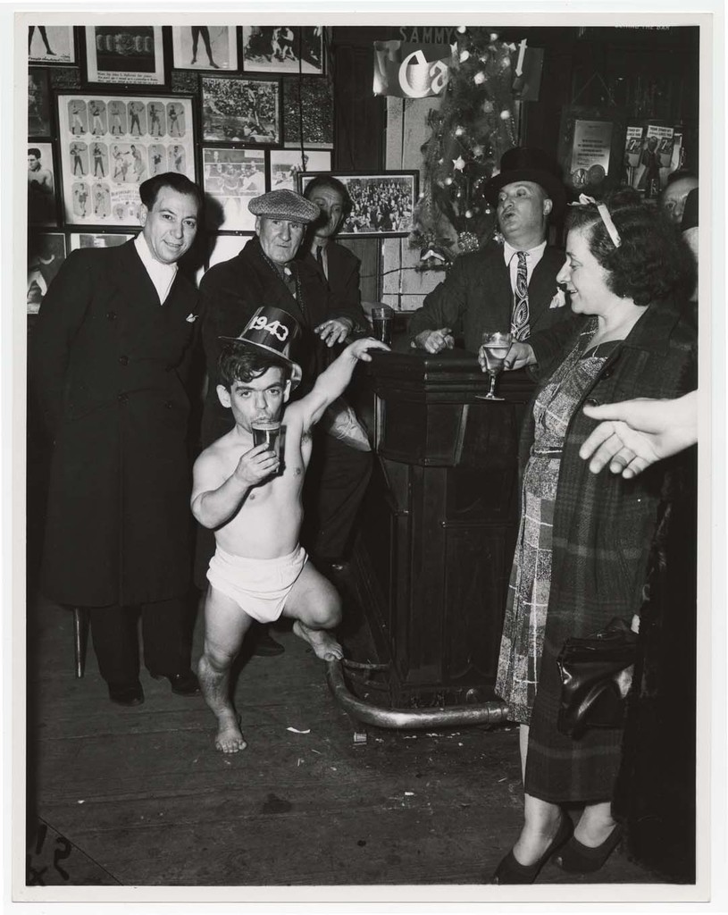 Shorty, the Bowery Cherub, New Year’s Eve at Sammy’s Bar, New York], 1943 © Weegee