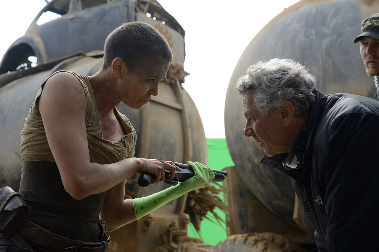 Charlize Theron and George Miller on the set of Mad Max: Fury Road (2015)