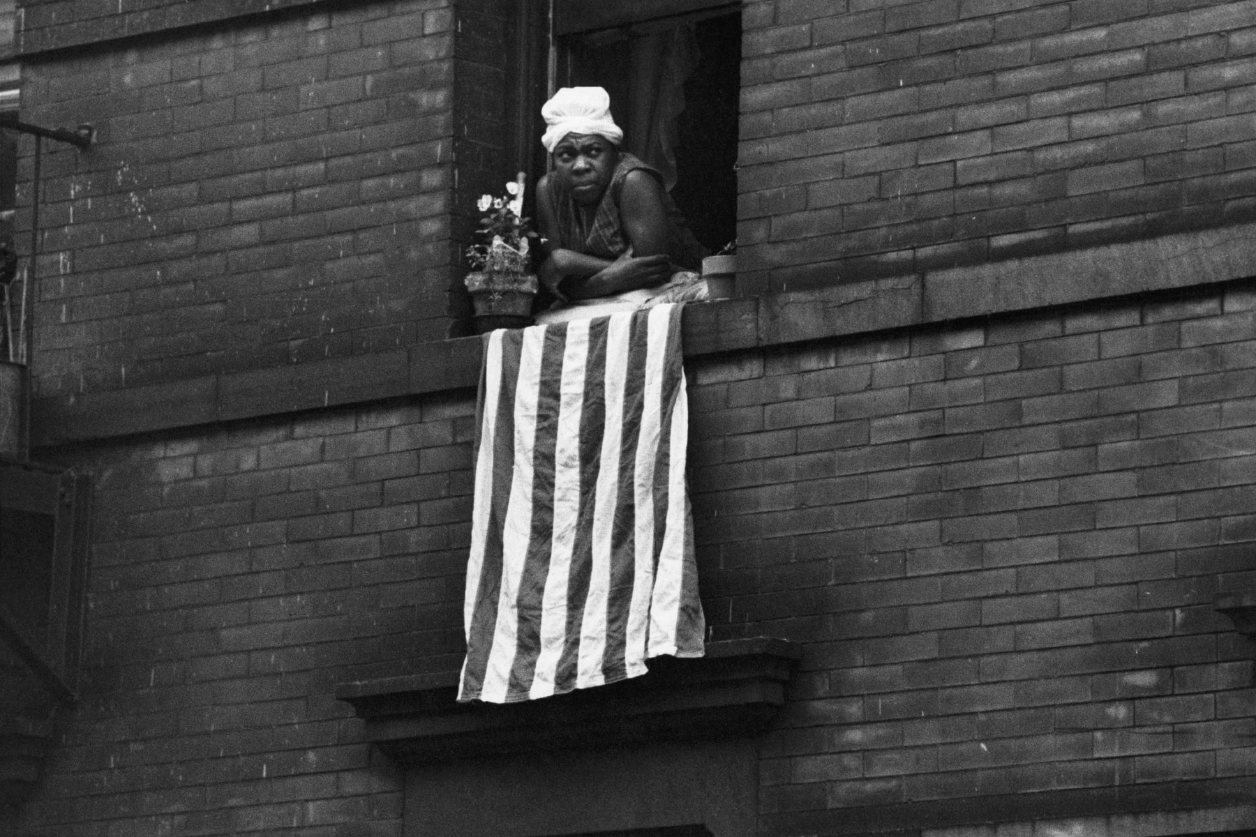 Time of Change (woman at window with American flag), Bruce Davidson, 1962